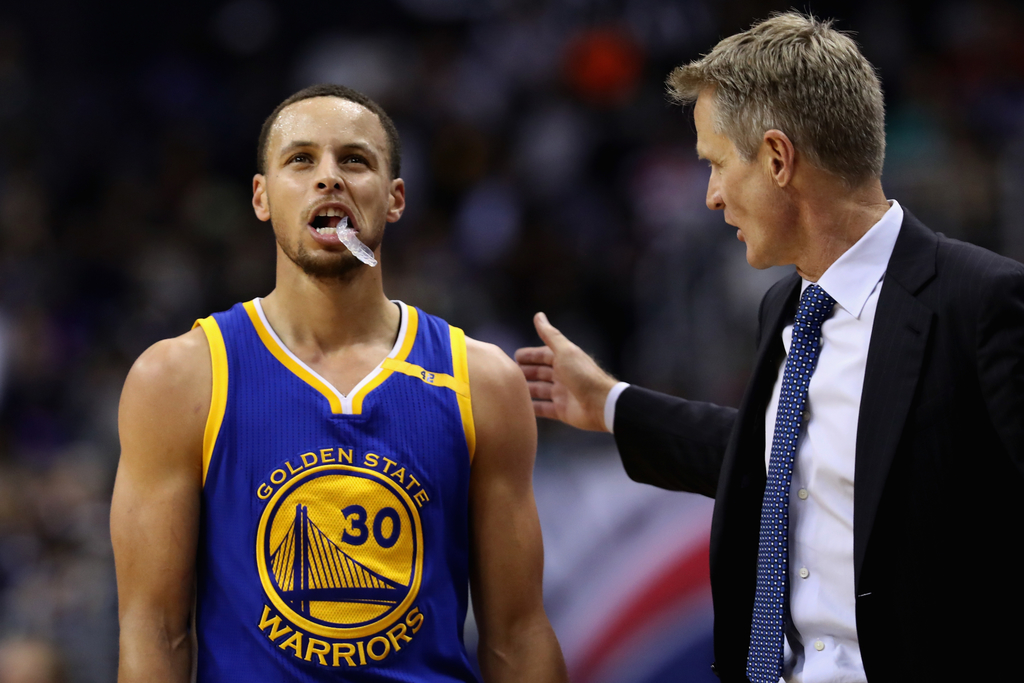 Stephen Curry and Steve Kerr of the Golden State Warriors