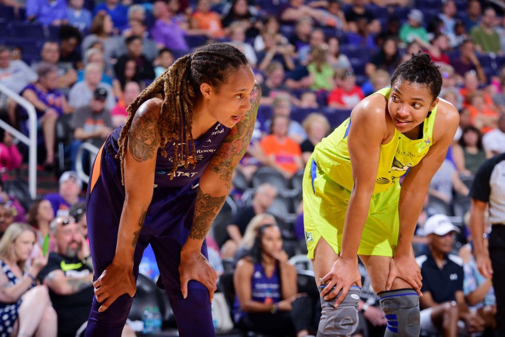 Brittney Griner of the Phoenix Mercury and Imani McGee-Stafford of the Dallas Wings