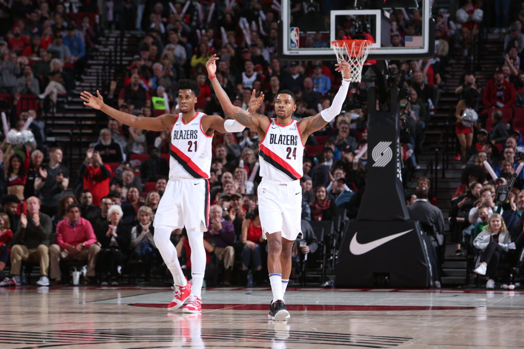 Hassan Whiteside, Kent Bazemore of the Portland Trail Blazers