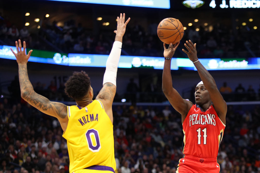 Jrue Holiday of the New Orleans Pelicans, Kyle Kuzma of the Los Angeles Lakers