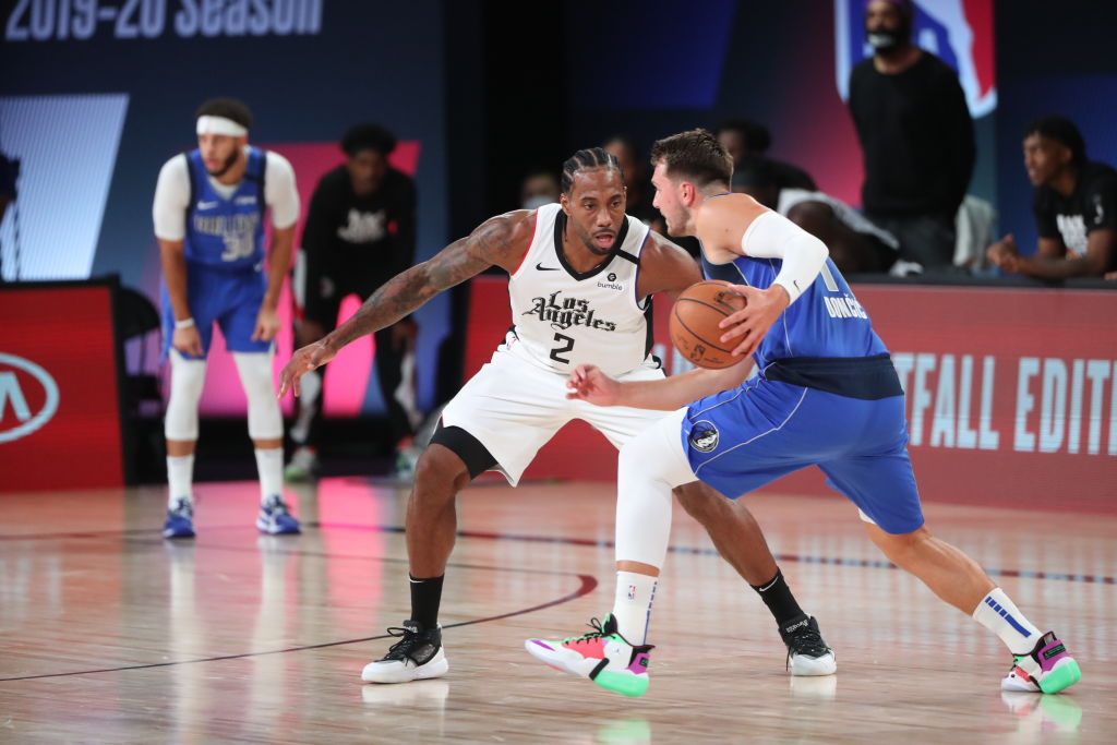 Kawhi Leonard of the Los Angeles Clippers and Luka Doncic of the Dallas Mavericks