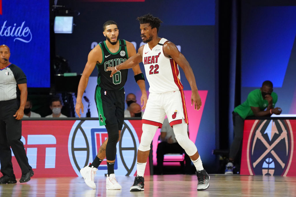 Jayson Tatum of the Boston Celtics and Jimmy Butler of the Miami Heat
