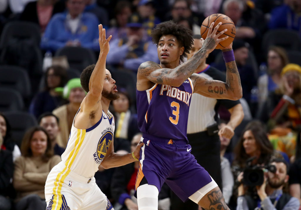 Steph Curry and Kelly Oubre Jr.
