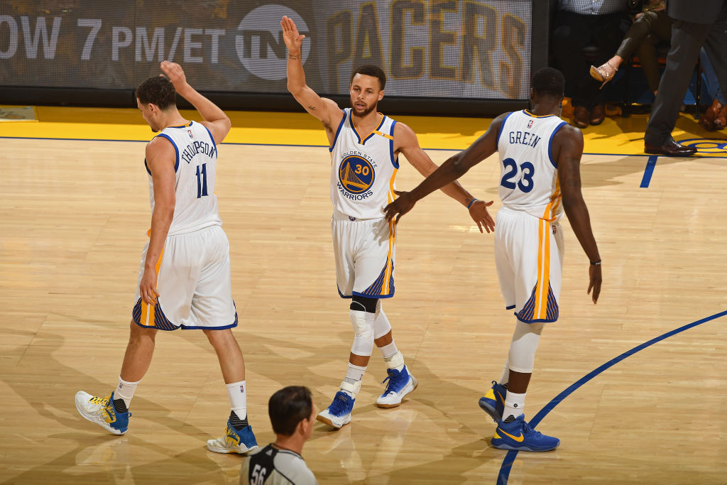 Steph Curry, Draymond Green, and Klay Thompson of the Golden State Warriors