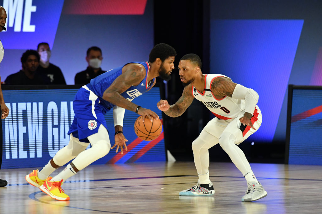 Damian Lillard of the Portland Trail Blazers and Paul George of the LA Clippers