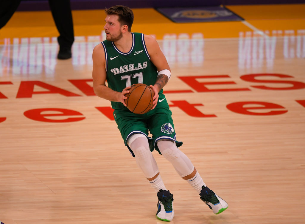 Luka Doncic of the Dallas Mavericks and LeBron James of the Los Angeles Lakers