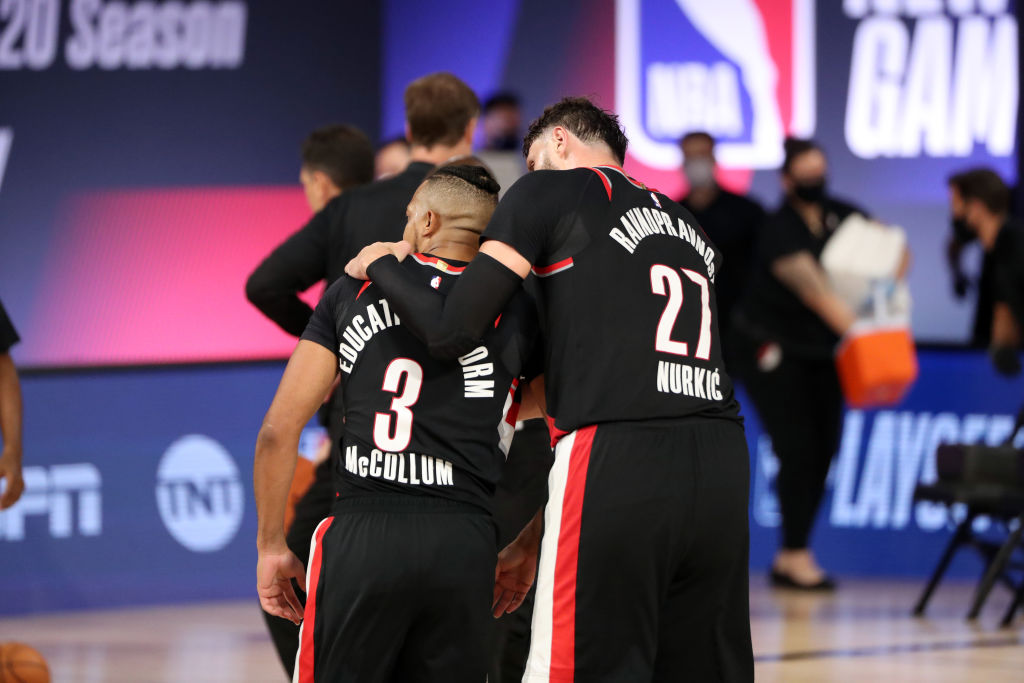 CJ McCollum and Jusuf Nurkic of the Portland Trail Blazers