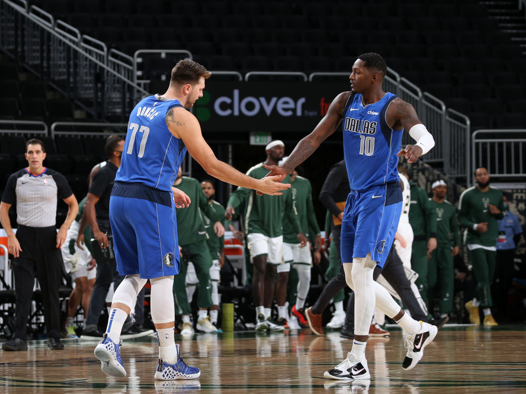 Luka Doncic and Dorian Finney-Smith of the Dallas Mavericks