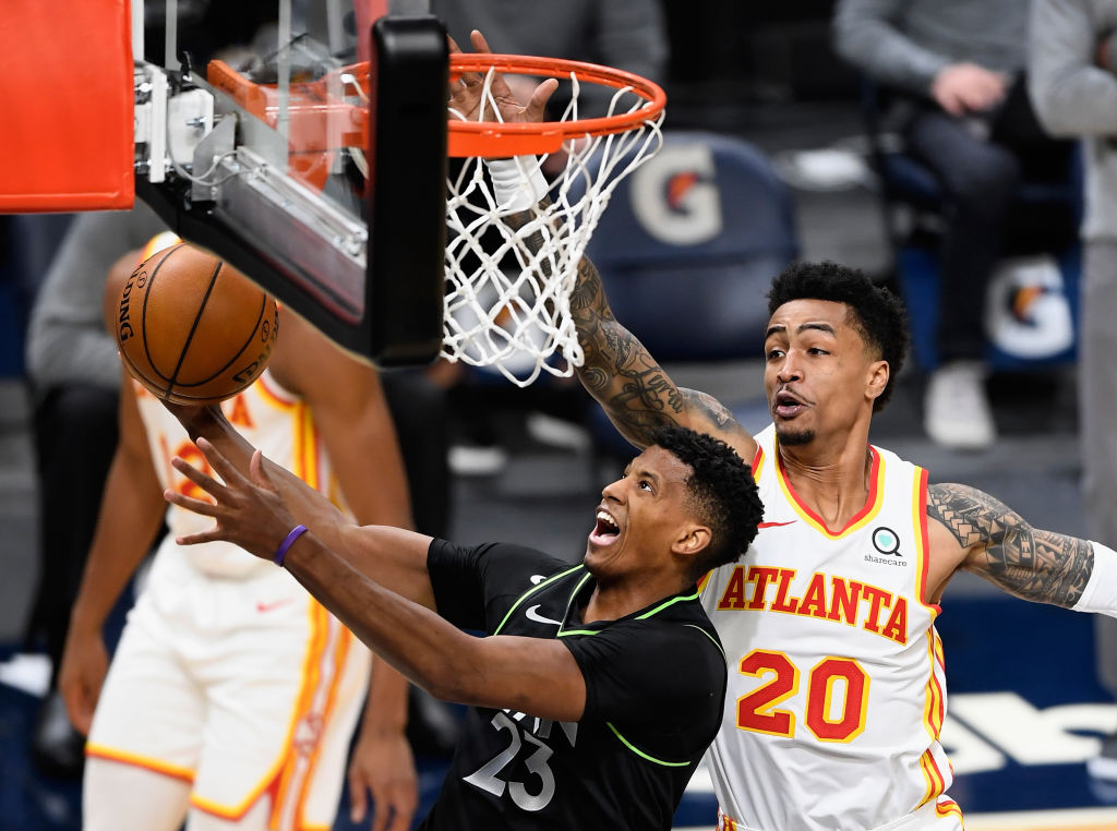 John Collins of the Atlanta Hawks and Jarrett Culver of the Minnesota Timberwolves