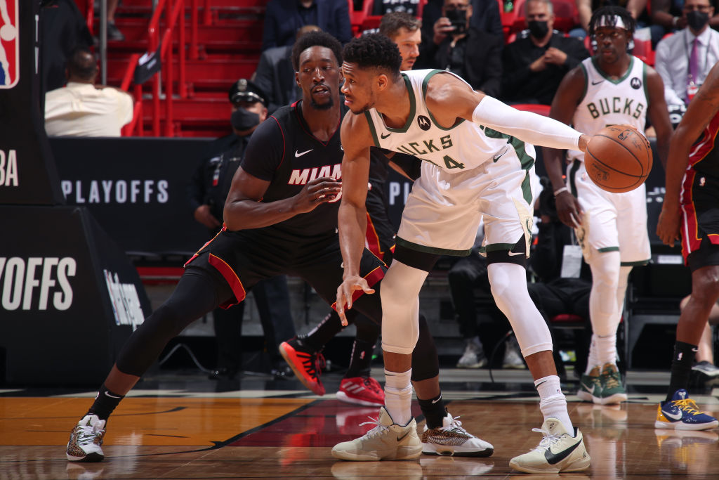 Giannis Antetokounmpo of the Milwaukee Bucks and Bam Adebayo of the Miami Heat