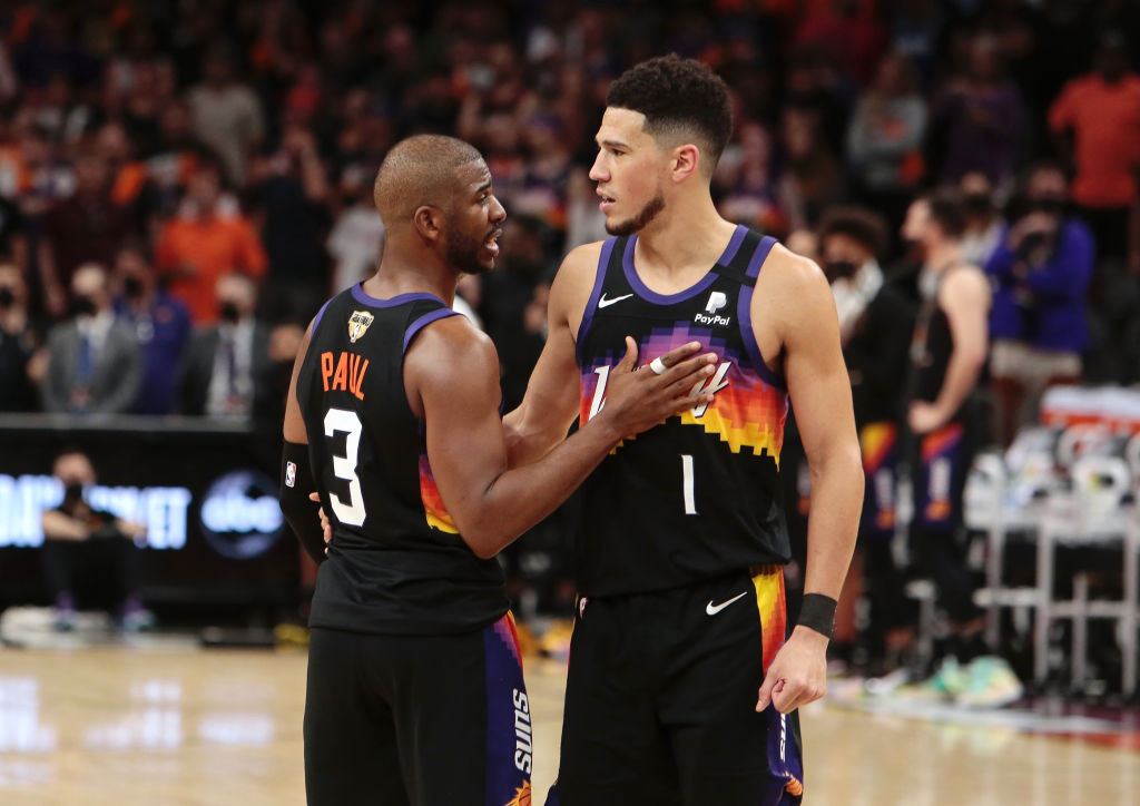Chris Paul and Devin Booker of the Phoenix Suns