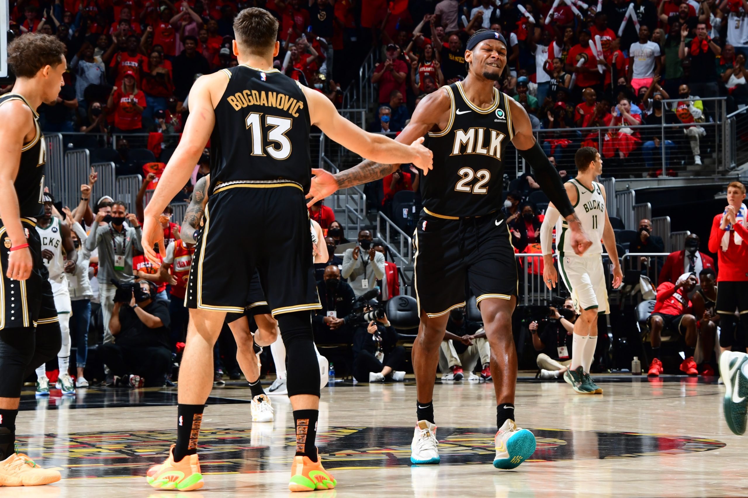 Cam Reddish and Bogdan Bogdanovic of the Atlanta Hawks
