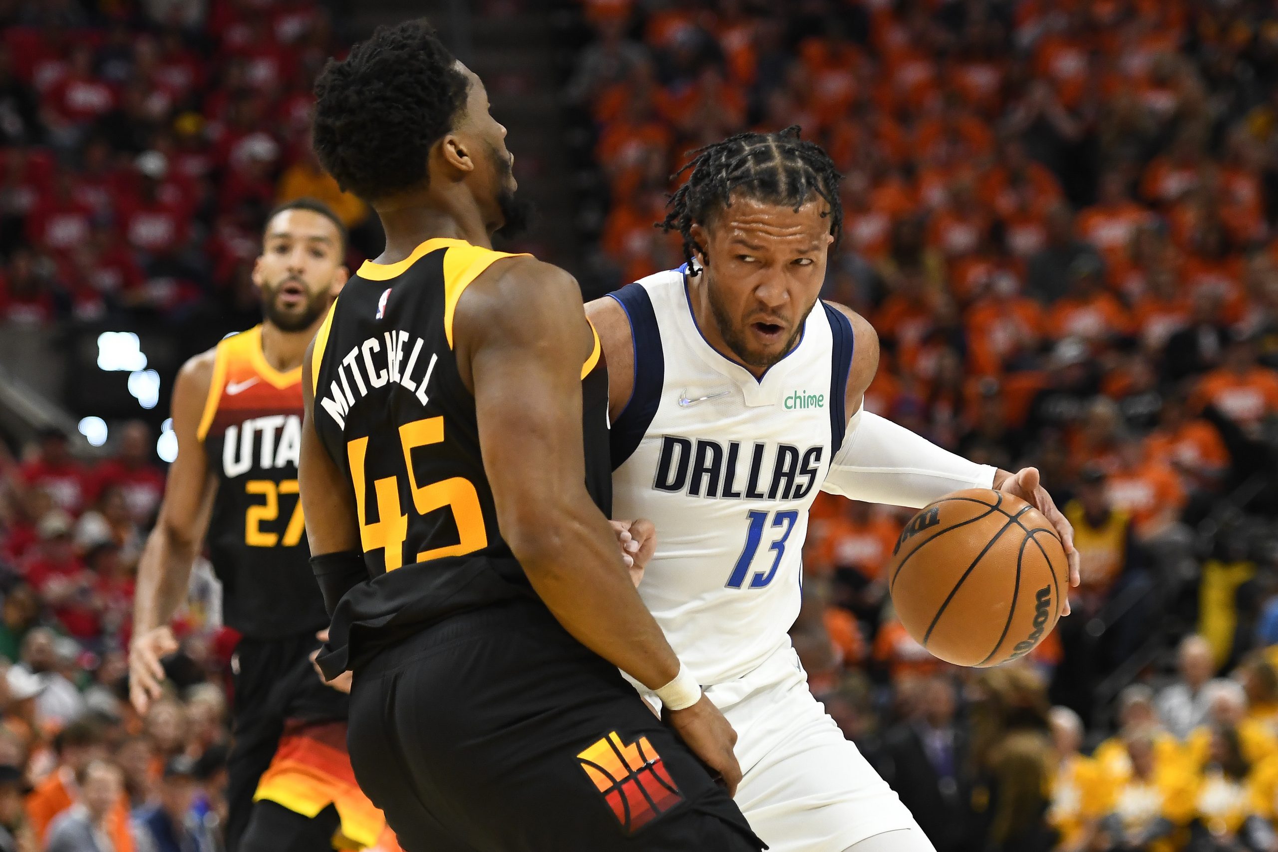 Jalen Brunson of the Dallas Mavericks and Donovan Mitchell of the Utah Jazz
